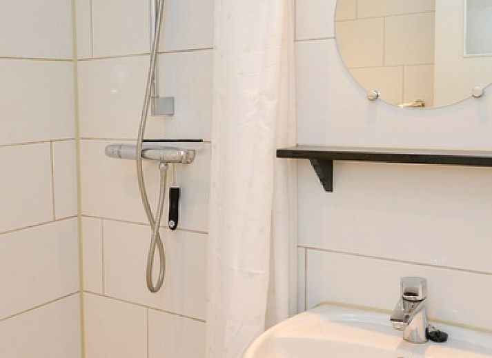 Gemuetliches Wohnzimmer von 3980 Bauernhaus Leiden in Sued-Eierland, Texel mit Blick auf den Garten