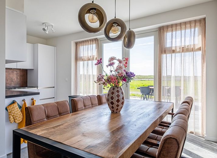 Ferienhaus De Noordbunder in Zuid-Eierland, Texel mit herrlicher Aussicht auf die gruene Umgebung.