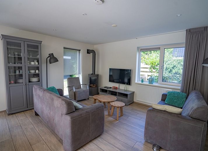 Ferienhaus de Parel 150 in De Dennen, Texel mit sonniger Terrasse und grossem Garten.