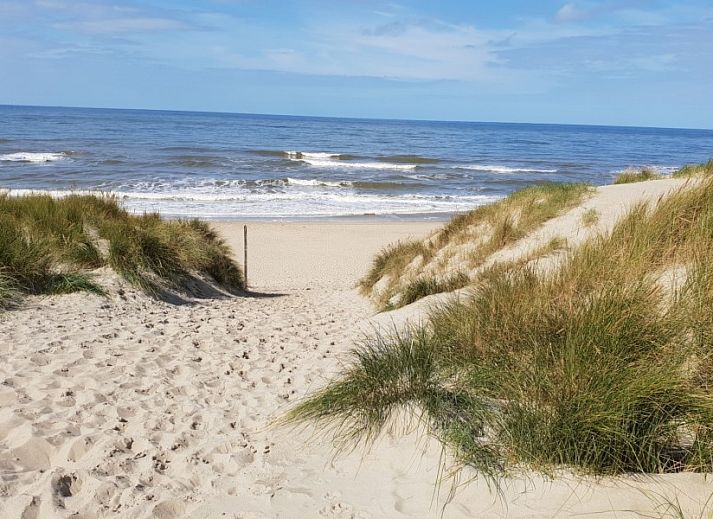 Slaapkamer met twee bedden in De Strandloper vakantiehuis, De Koog, Texel.