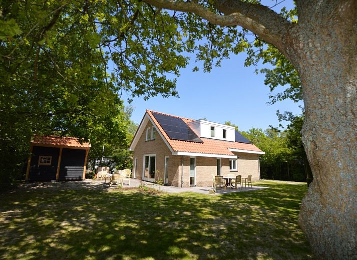 Ferienhaus De Nagtegaal 23 in De Dennen Texel mit grossem Garten und Terrasse zum Entspannen.