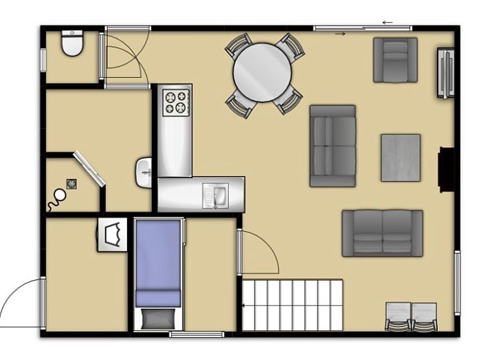 Gezellige woonkamer van Vakantiehuis Gortersmient 330 in De Dennen, Texel met comfortabele banken.