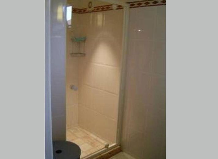 Vakantiehuis Gortersmient 356 in De Dennen Texel met zonnig terras en comfortabele tuinset.