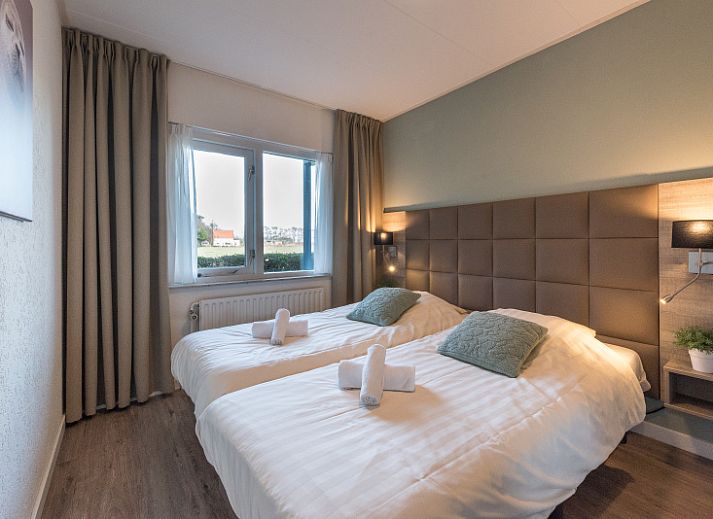 Stijlvolle eetruimte in Appartement Bos en Duin 12, De Dennen, Texel, ideaal voor gezellige maaltijden.