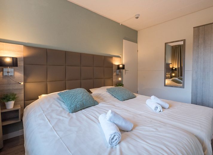 Stijlvolle eetruimte in Appartement Bos en Duin 12, De Dennen, Texel, ideaal voor gezellige maaltijden.