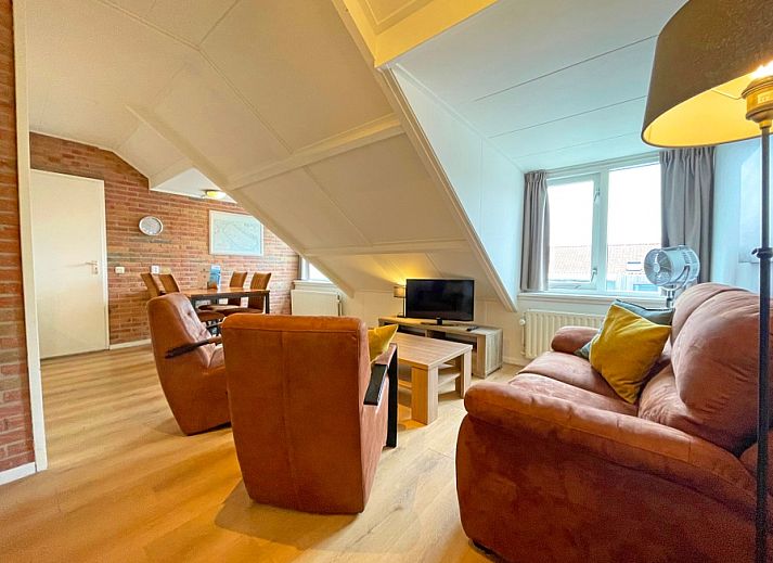 Cozy living room in Apartment Bos en Duin 34, De Dennen, Texel with comfortable seating area.