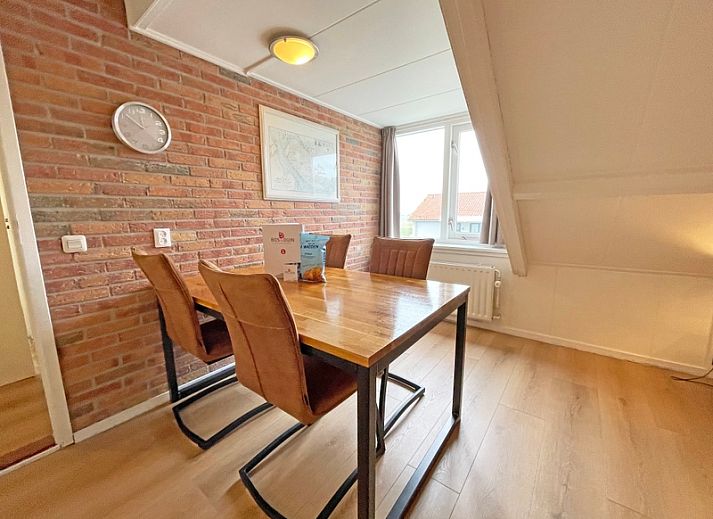 Cozy living room in Apartment Bos en Duin 34, De Dennen, Texel with comfortable seating area.