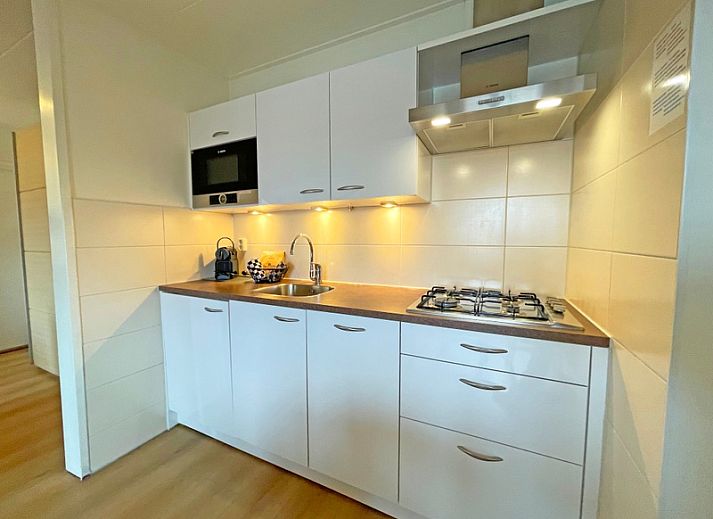 Spacious and bright living room of Apartment Bos en Duin 34 in De Dennen, Texel.