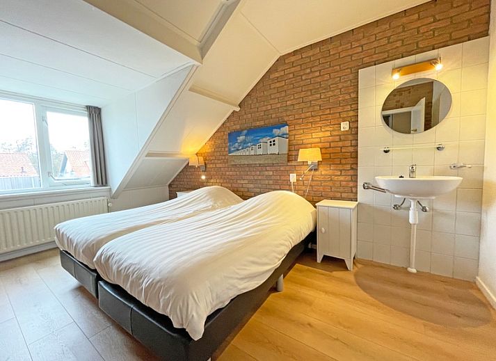 Spacious and bright living room of Apartment Bos en Duin 34 in De Dennen, Texel.