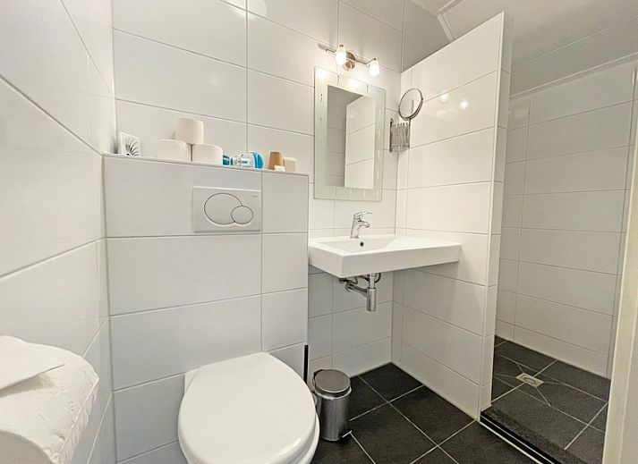 Spacious and bright living room of Apartment Bos en Duin 34 in De Dennen, Texel.