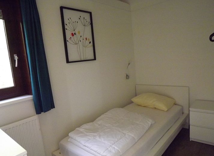 Gezellige binnenruimte met eethoek in Vakantiehuis Gortersmient 210, De Dennen, Texel.