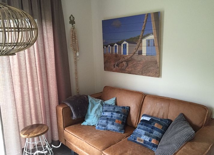 Relax in the green garden of Vakantiepark de Bremakker - Chalet on Texel, Weideveld 80, with comfortable sitting area in De Dennen, Texel.