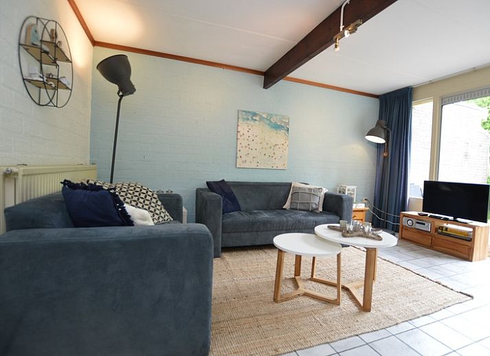 Bungalow Verste Coogh 56 in De Dennen, Texel, met ruime tuin en terras voor ontspanning op de Waddeneilanden.