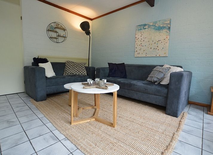 Bungalow Verste Coogh 56 in De Dennen, Texel, met ruime tuin en terras voor ontspanning op de Waddeneilanden.