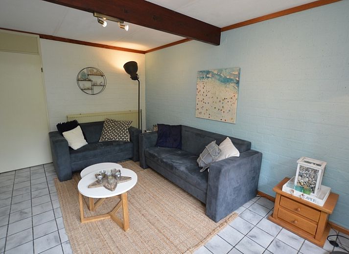 Bungalow Verste Coogh 56 in De Dennen, Texel, met ruime tuin en terras voor ontspanning op de Waddeneilanden.