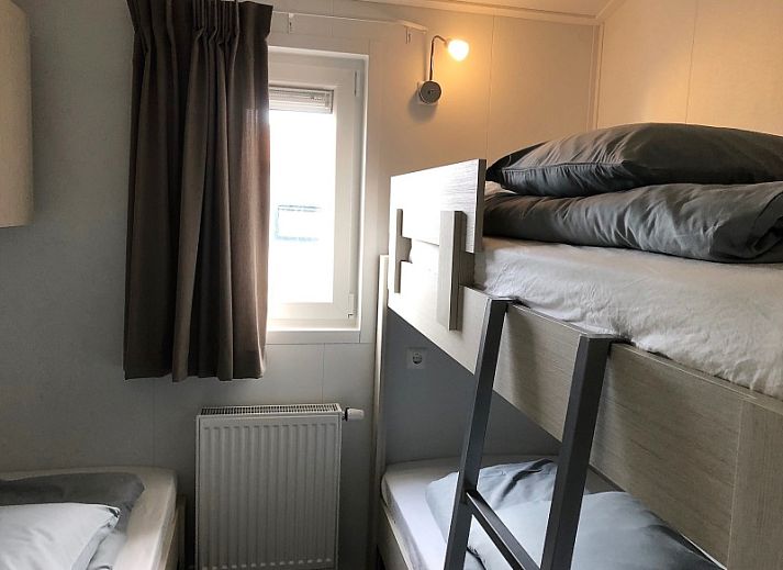 Vakantiepark de Bremakker - Bosveld 103, vakantiehuis in De Dennen, Texel met zonnige tuin en terras omringd door natuur.