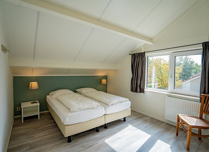 Offener Wohnbereich im Ferienhaus 't Hoogelandt 134A, De Dennen, Texel mit Kueche und Essbereich.