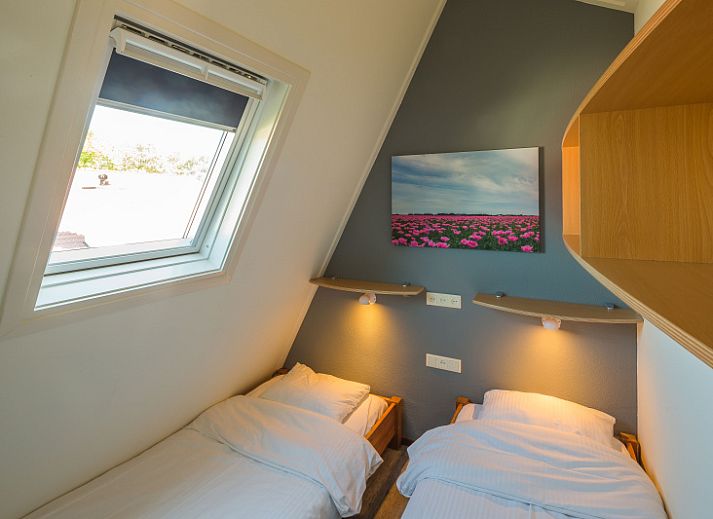 Gemuetlicher Garten mit Sitzgelegenheiten in Gortersmient 310, Bungalowpark Gortersmient, De Dennen, Texel, ideal zum Entspannen.