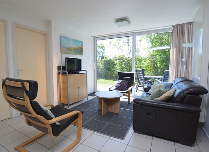 Das Ferienhaus de Parel 262 liegt mitten im Gruenen in De Dennen, Texel. Perfekt fuer Entspannung auf den Watteninseln.