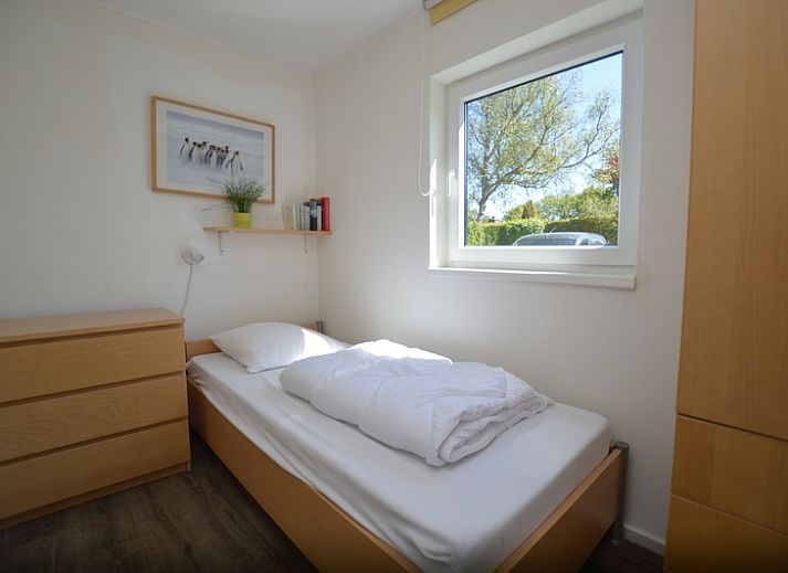 Gemuetliches Wohnzimmer im Ferienhaus de Parel 262, De Dennen, Texel. Ideal fuer einen erholsamen Aufenthalt auf den Watteninseln.