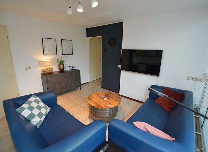 Vakantiehuis de Parel 244 in De Dennen, Texel, Waddeneilanden met groene tuin en moderne architectuur.