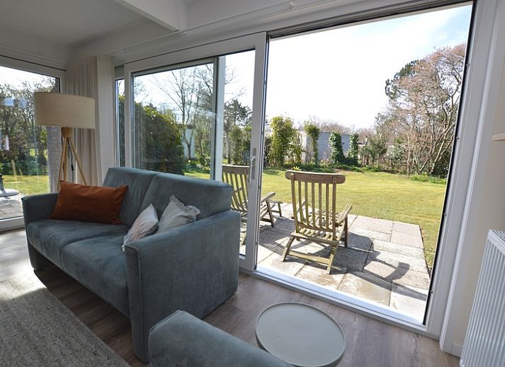 Bungalow Verste Coogh 58 in De Dennen, Texel met zonnige tuin en terras voor ontspanning.