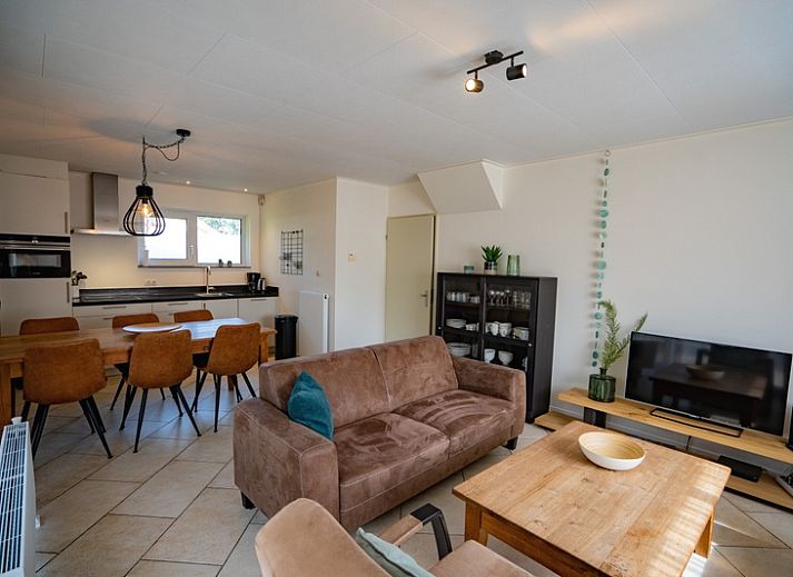 Exterior of Holiday Home 't Hoogelandt 136A in De Dennen, Texel with spacious garden and terrace.