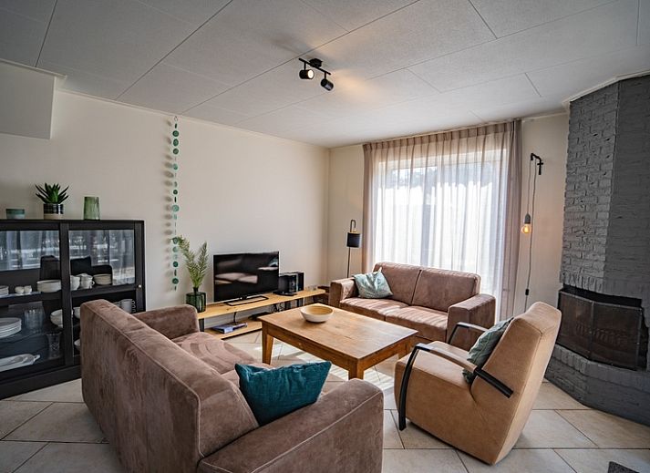 Exterior of Holiday Home 't Hoogelandt 136A in De Dennen, Texel with spacious garden and terrace.