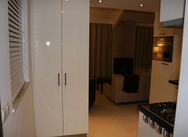 Rustige omgeving van Vakantiehuis Gortersmient 354 in De Dennen, Texel met omringende natuur.