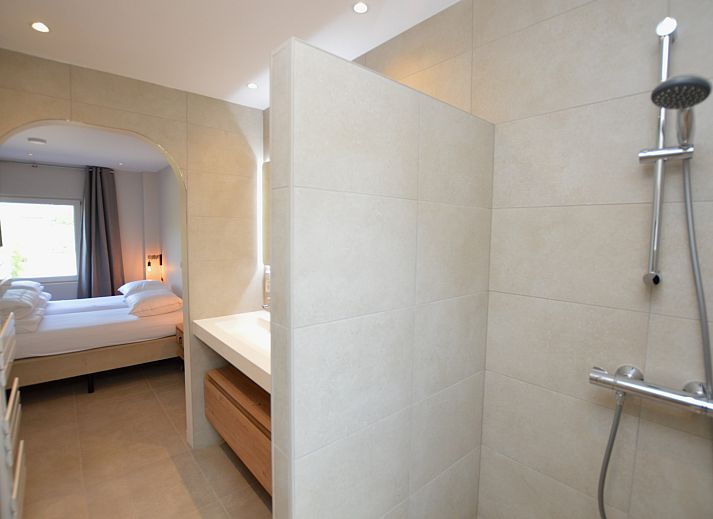 Gemuetliche Sitzecke im Ferienhaus Tempelierweg - Kogermient 18, De Dennen, Texel mit Flachbildfernseher.