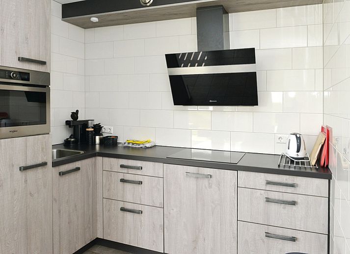 Helles Wohnzimmer im Ferienhaus De Mispel, De Dennen, Texel mit komfortabler Einrichtung.