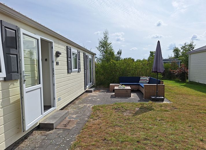 Ferienpark de Bremakker - Akkerveld 23 Ferienhaus in De Dennen, Texel mit gruenem Garten und Terrasse.