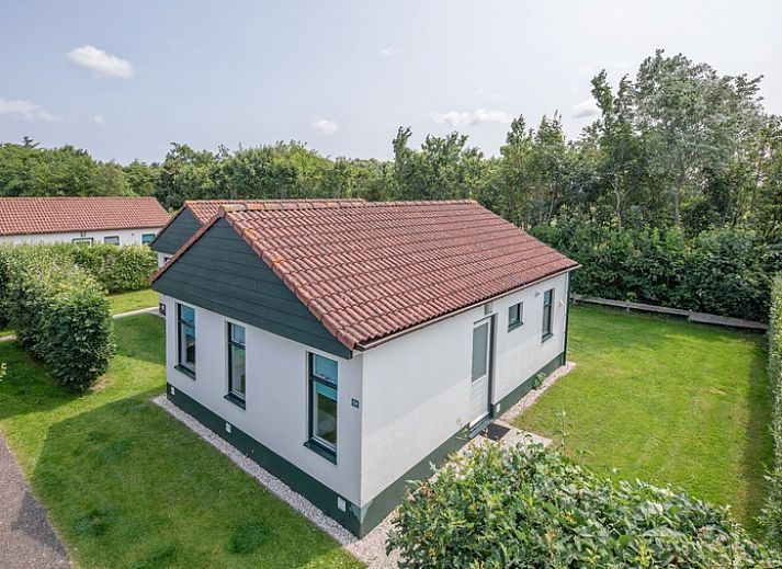 Familienaktivitaeten auf der Terrasse des Ferienhauses Typ 2 - 4 Personen in De Dennen, Texel.