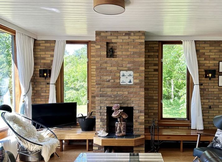 Stijlvolle eet- en woonkamer in Texel Bungalow 257, De Koog, met moderne inrichting en veel natuurlijk licht op de Waddeneilanden.
