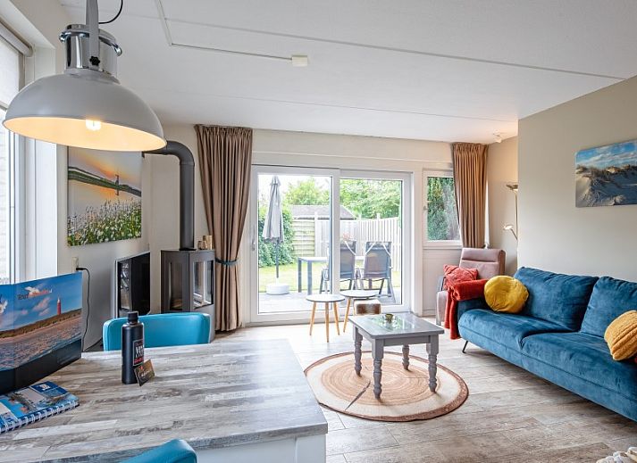 Wulpenweid 14 Zeehond vakantiehuis in De Dennen Texel met zonnig terras en groene tuin.