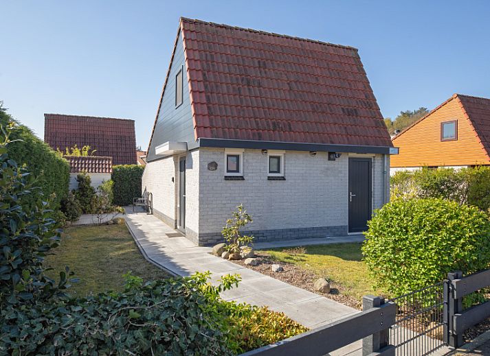 Gemuetliches Wohnzimmer mit Kamin im Ferienhaus Gortersmient 236, Bungalowpark Gortersmient, De Dennen Texel.