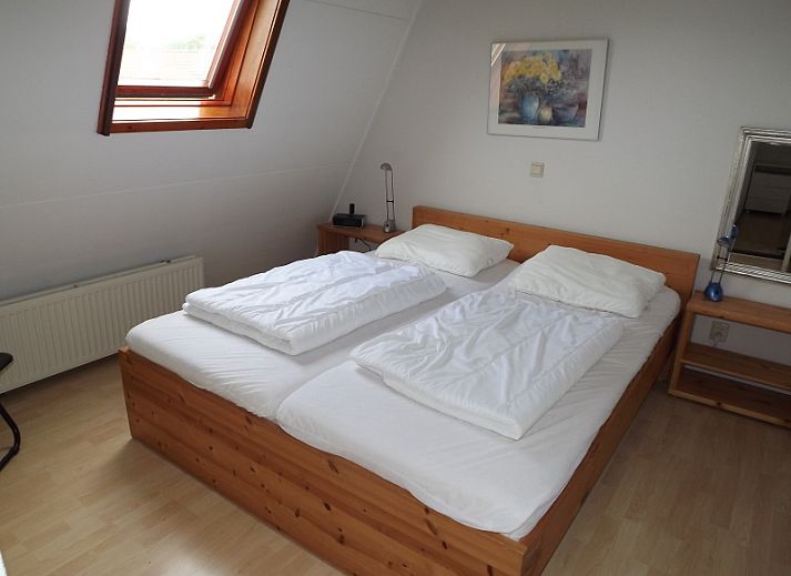 Offene Kueche und Essbereich im Ferienhaus Gortersmient 260, De Dennen, Texel, fuer einen komfortablen Aufenthalt.