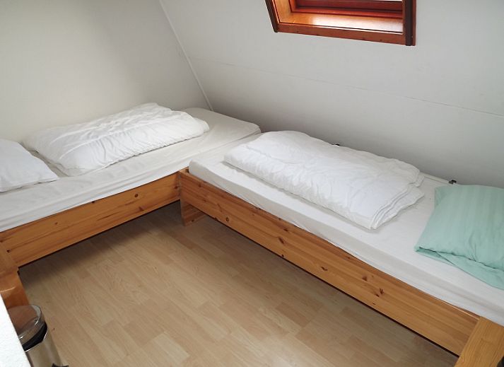 Offene Kueche und Essbereich im Ferienhaus Gortersmient 260, De Dennen, Texel, fuer einen komfortablen Aufenthalt.