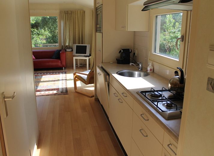 Vakantiepark de Bremakker's vakantiehuis Heitje 166 in De Dennen, Texel, met terras en omringd door natuur op de Waddeneilanden.