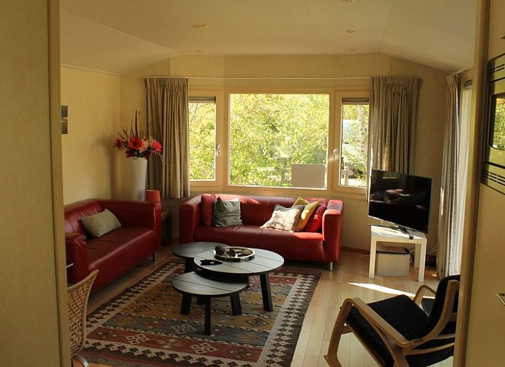 Vakantiepark de Bremakker - Heitje 166, charmant vakantiehuis in De Dennen, Texel, met zonnig terras en groene omgeving op de Waddeneilanden.