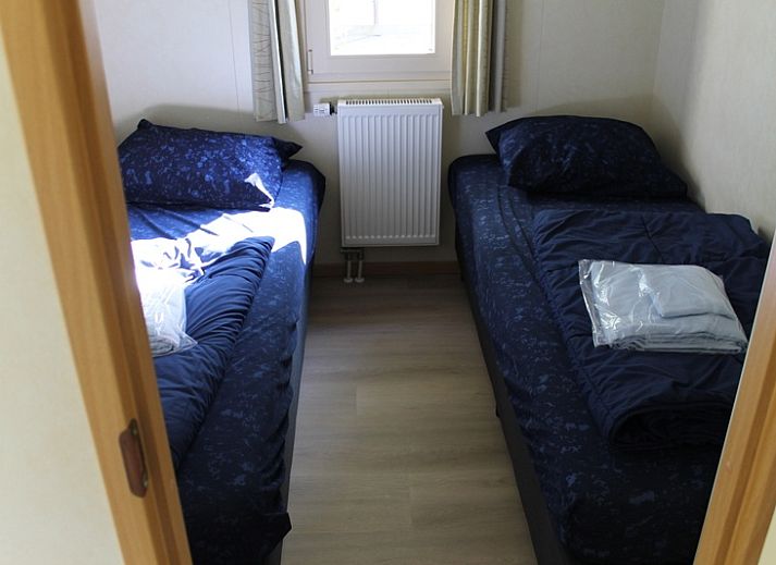 Vakantiepark de Bremakker - Heitje 166, charmant vakantiehuis in De Dennen, Texel, met zonnig terras en groene omgeving op de Waddeneilanden.