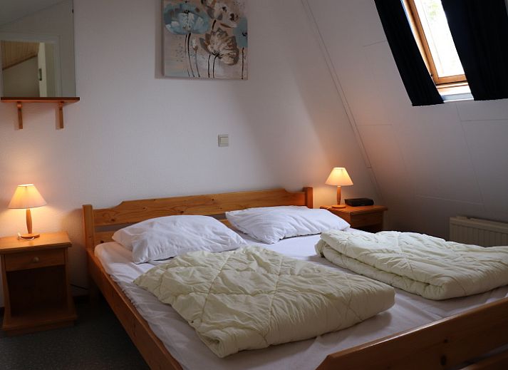 Cozy living room of Holiday home Gortersmient 290 in De Dennen, Texel.