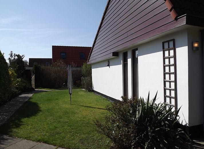 Cozy living room of Holiday home Gortersmient 290 in De Dennen, Texel.