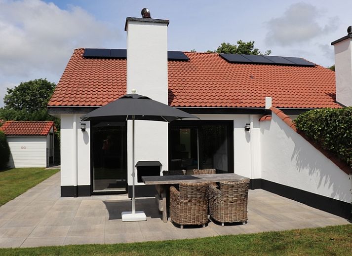 Gezellige eetkamer in Vakantiehuis Gortersmient 302, De Dennen, Texel.