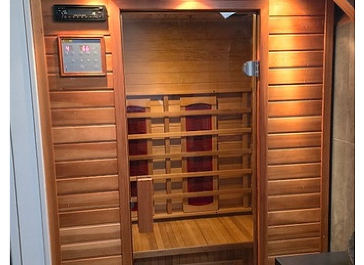 Helianthus Unterkunft in De Dennen Texel mit Blick auf Pferdeweiden fuer eine laendliche Erfahrung.