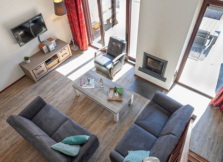 Vakantiehuis Gortersmient 328 in De Dennen, Texel met ruime buitenruimte en tuinmeubilair.