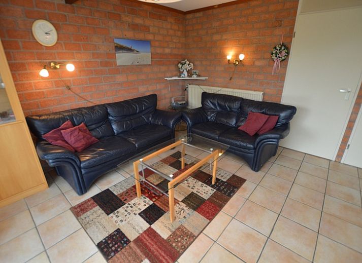 Bungalow Verste Coogh 140 in De Dennen, Texel met groene tuin en zonnige buitenruimte.