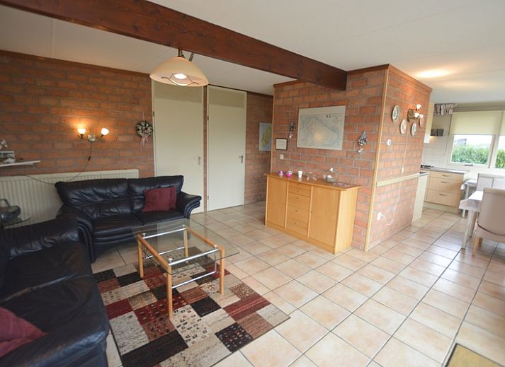 Bungalow Verste Coogh 140 in De Dennen, Texel met groene tuin en zonnige buitenruimte.