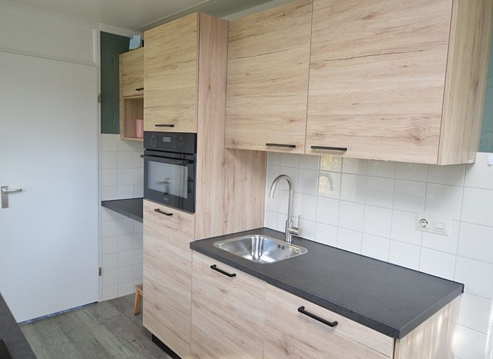 Gezellige woonkamer in Bungalow Verste Coogh 66, vakantiehuis in De Dennen, Texel.