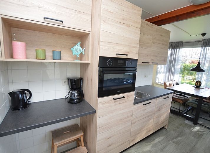 Gezellige woonkamer in Bungalow Verste Coogh 66, vakantiehuis in De Dennen, Texel.